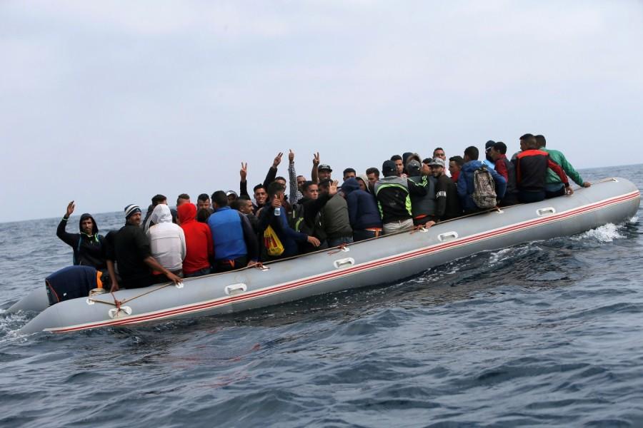 Migrants land on Spanish beach Boat full of migrants,Spanish beach,migrants on Spanish beach,30 illegal migrants