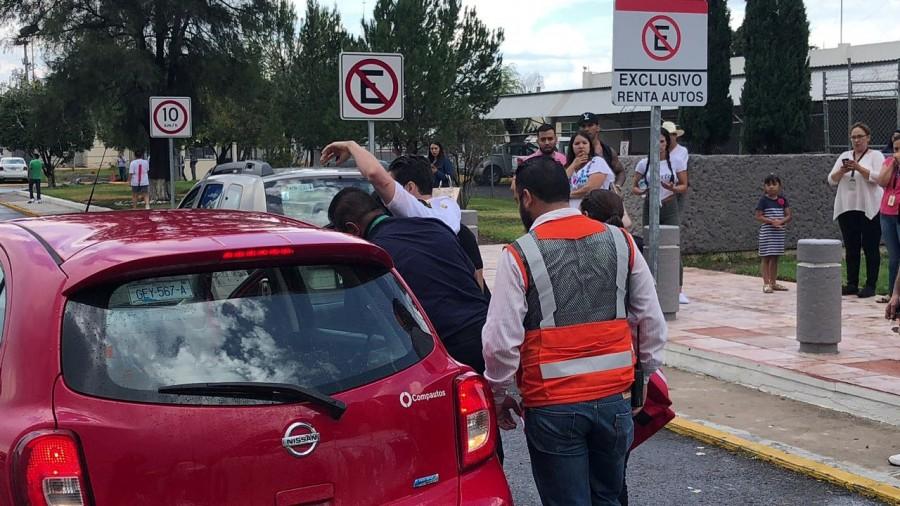 A man is helped into a car outside the Durango Airport Aeromexico plane,Aeromexico plane crashes,Aeromexico commercial flight,Durango,Aeromexico plane crashes in Durango