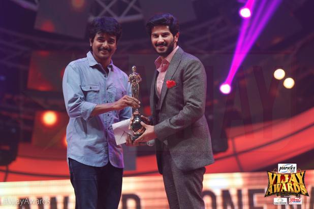 Best Debut Male Actor - Sivakartikeyan giving award to DulQuer Vijay Awards,Vijay Awards 2015,9th Annual Vijay awards,Vijay Awards winners,Vijay Awards 2015 winnes photos,Vijay Awards winner list,Vijay Awards pics,Vijay Awards images,Vijay Awards stills