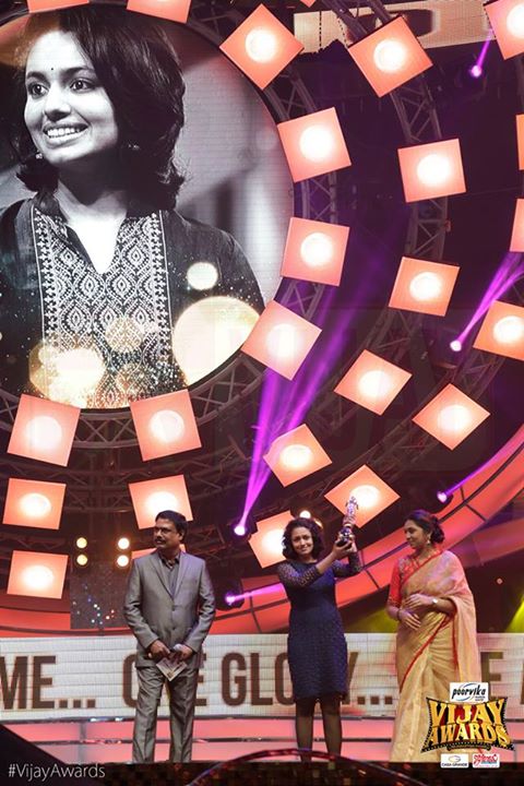 Malavika Nair while getting her award for Best Debut Female Actor Vijay Awards,Vijay Awards 2015,9th Annual Vijay awards,Vijay Awards winners,Vijay Awards 2015 winnes photos,Vijay Awards winner list,Vijay Awards pics,Vijay Awards images,Vijay Awards stills