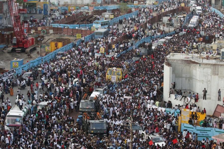 Karunanidhi laid to rest as thousands pay homage Marina beach,Karunanidhi,Karunanidhi laid to rest at Marina beach,Annadurai,iconic Anna Memorial,Anna Memorial,DMK president