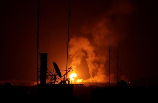 An explosion is seen during Israeli air strikes in Gaza