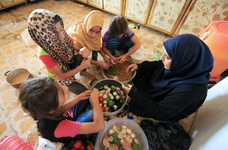 Iraqi grandmother prepares food with grandchildren Islamic State killed,Sana Ibrahim al-Taee,Iraqi grandmother Sana Ibrahim al-Taee,Islamic,Islamic state