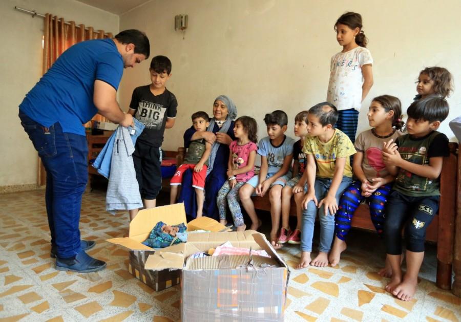 Grandchildren's receives clothes Islamic State killed,Sana Ibrahim al-Taee,Iraqi grandmother Sana Ibrahim al-Taee,Islamic,Islamic state