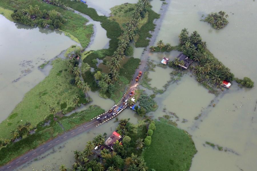 An aerial view shows partially submerged road Kerala floods,Kerala floods pics,Kerala floods images,Kerala floods stills,Kerala floods pictures,Kerala floods photos,Kerala worst flood