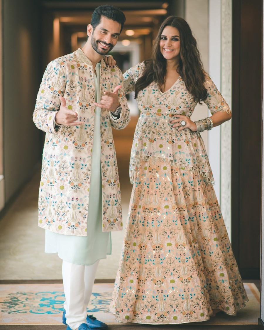 Neha Dhupia debuts baby bump with husband Angad Bedi Neha Dhupia,Neha Dhupia baby bump,Neha Dhupia baby bump pics,Neha Dhupia baby bump images,Angad Bedi,Neha Dhupia and Angad Bedi,Lakme Fashion Week,Lakme Fashion Week 2018