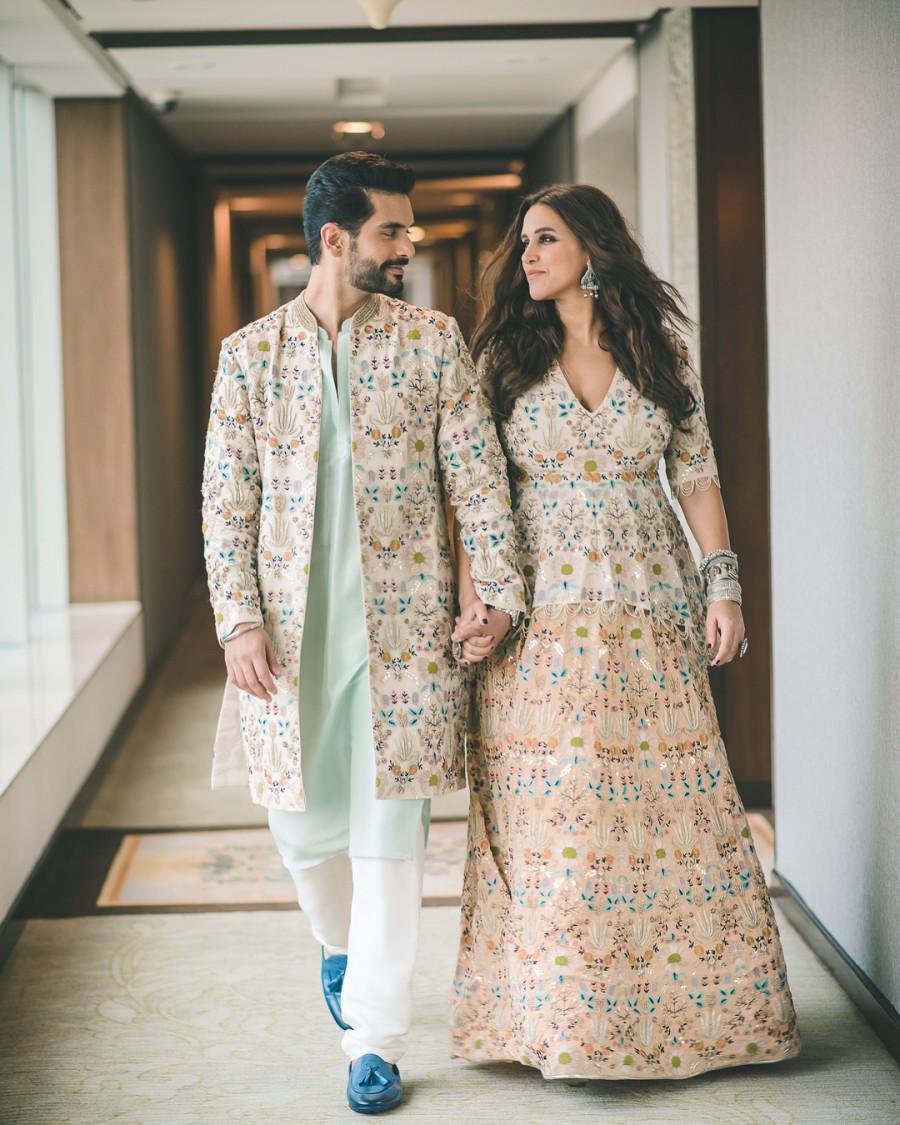 Neha Dhupia with husband Angad Bedi Neha Dhupia,Neha Dhupia baby bump,Neha Dhupia baby bump pics,Neha Dhupia baby bump images,Angad Bedi,Neha Dhupia and Angad Bedi,Lakme Fashion Week,Lakme Fashion Week 2018