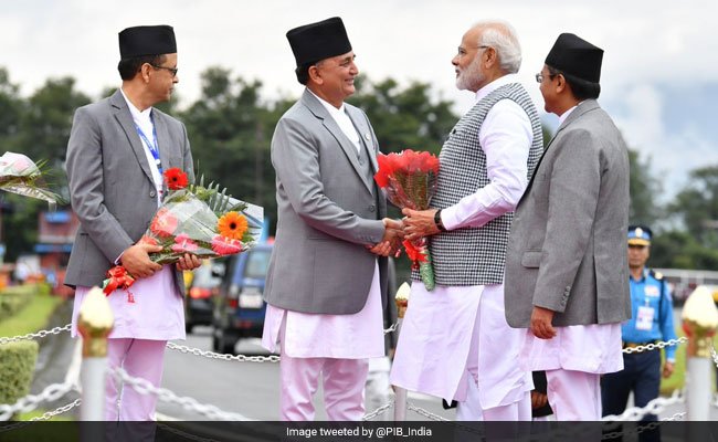 PM Modi received by Nepal's defence minister Ishwar Pokhrel Narendra Modi,PM Narendra Modi,Narendra Modi in Kathmandu,Modi in Kathmandu,Narendra Modi in Nepal,BIMSTEC summit,Modi BIMSTEC summit