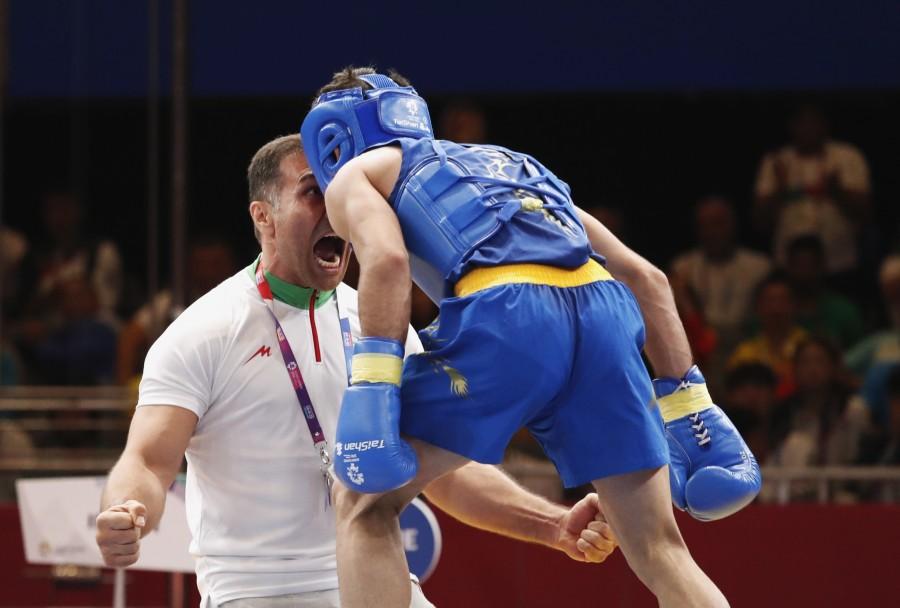 Ahangarian Erfan of Iran reacts with coaching staff Asian games 2018,Asian Games 2018 Medal,Asian Games 2018 Medal Winners,Asian Games 2018 Medals tally,Asian Games 2018 Photos,Asian Games 2018 Pictures