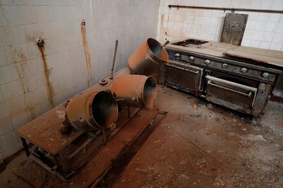 Old stoves are seen in the kitchen Portugal,Portugal jail,Portugal jail turns museum,Portugal jail as museum,notorious prison,notorious prison as museum