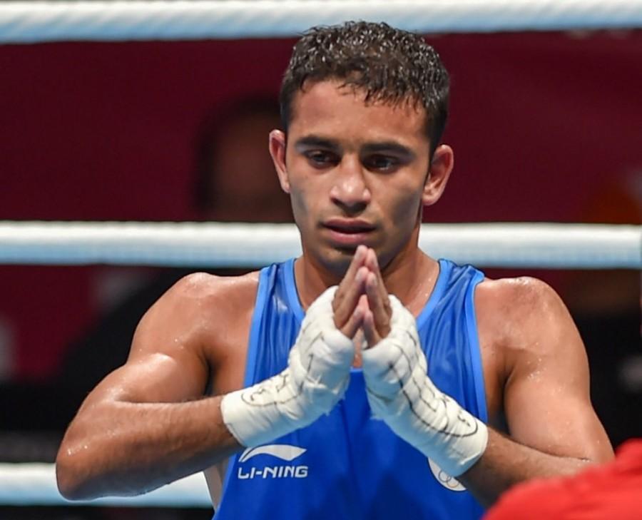 Amit Panghal, 22, stuns Olympic champion to win Gold Boxer Amit Panghal,Amit Panghal,Amit Panghal wins gold,Amit Panghal men's boxing,Asiad 2018,2018 Asian Games