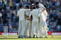 England spinner Moeen Ali is congratulated by team mates