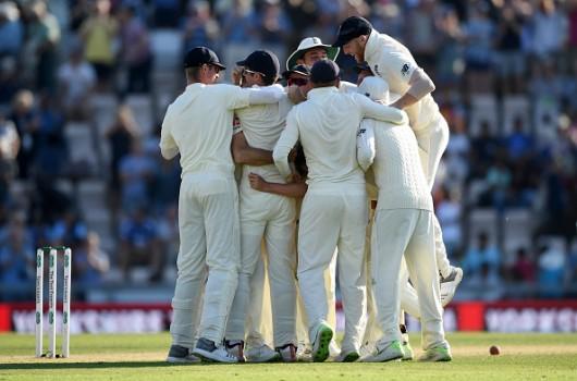 England spinner Moeen Ali is congratulated by team mates