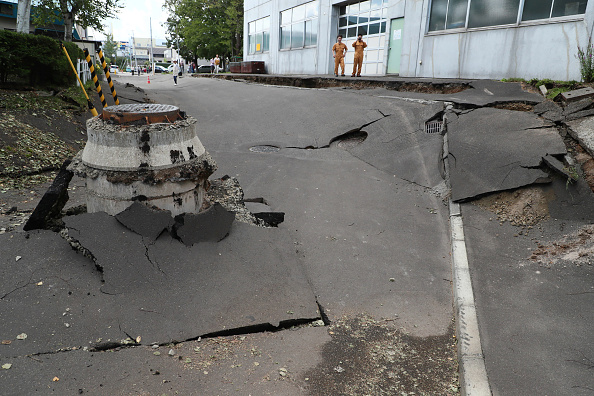 Residents look at the damage caused by an earthquake 6.7 magnitude earthquake,6.7 magnitude earthquake in Japan,Japan,Japan earthquake,Hokkaido island,Hokkaido island earthquake