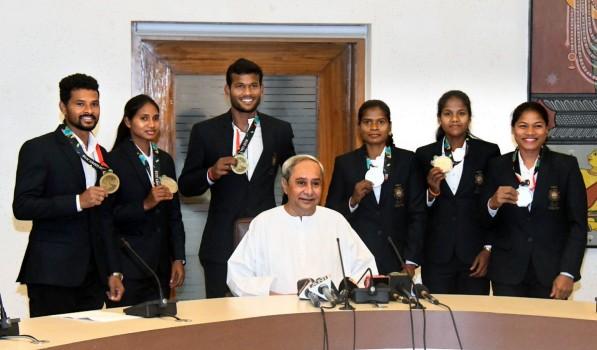 Odisha CM Naveen Patnaik presented cheques of Rs 1 Crore each to four players of the state