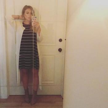 Hilary Duff flaunts her baby bump