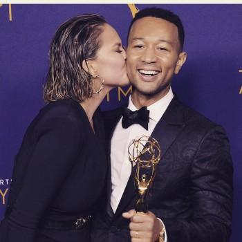 Chrissy Teigen shares a passionate kiss with John Legend