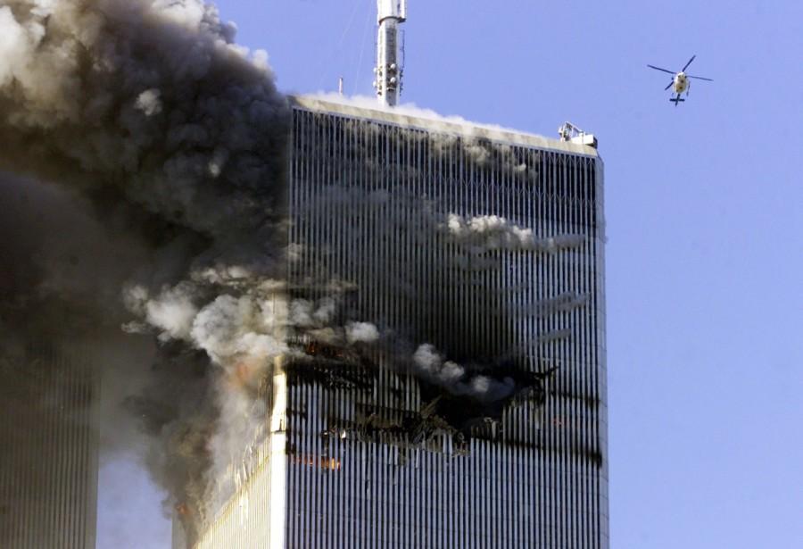 World Trade Center in New York City burns World Trade Center,World Trade Center attack,September 11 attack,Twin Towers attack,pentagon attack,9/11,9/11 pictures,World Trade Center attack pictures,powerful post attack pictures,United States,hijacked airplane,New York City,Pentagon building,north t