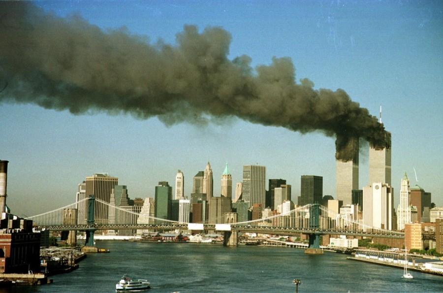 Towers of New York's World Trade Center pour smoke World Trade Center,World Trade Center attack,September 11 attack,Twin Towers attack,pentagon attack,9/11,9/11 pictures,World Trade Center attack pictures,powerful post attack pictures,United States,hijacked airplane,New York City,Pentagon building,north t