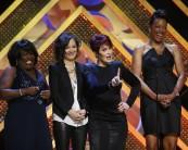 (L-R) The cast of The Talk, Sheryl Underwood, Sara Gilbert, Sharon Osbourne and Aisha Tyler, present the Outstanding Game Show host award at the 42nd Annual Daytime Emmy Awards